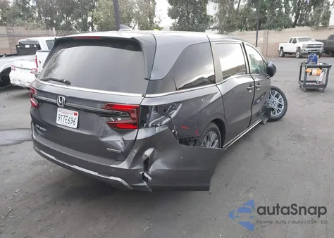2025 Honda Odyssey Touring from USA, damaged, VIN 5FNRL6H88SB068210
